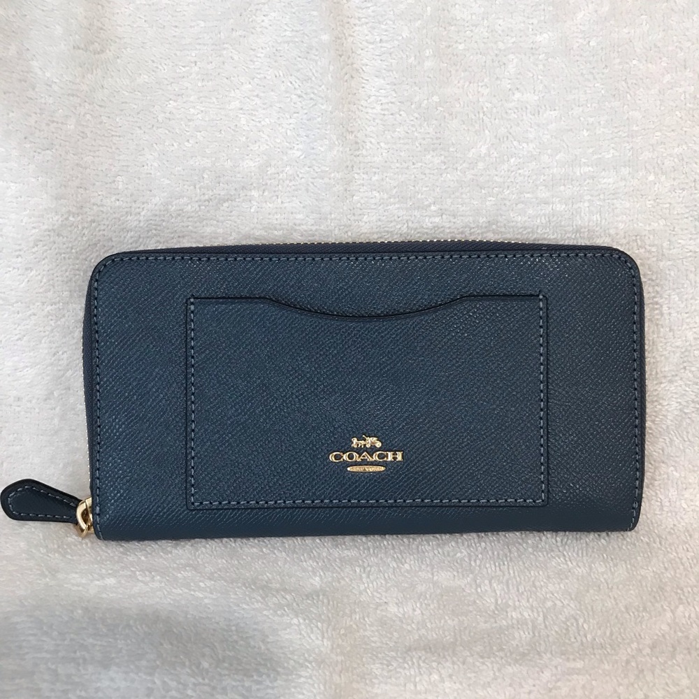 Coach. Medium zip around wallet, denim leather.